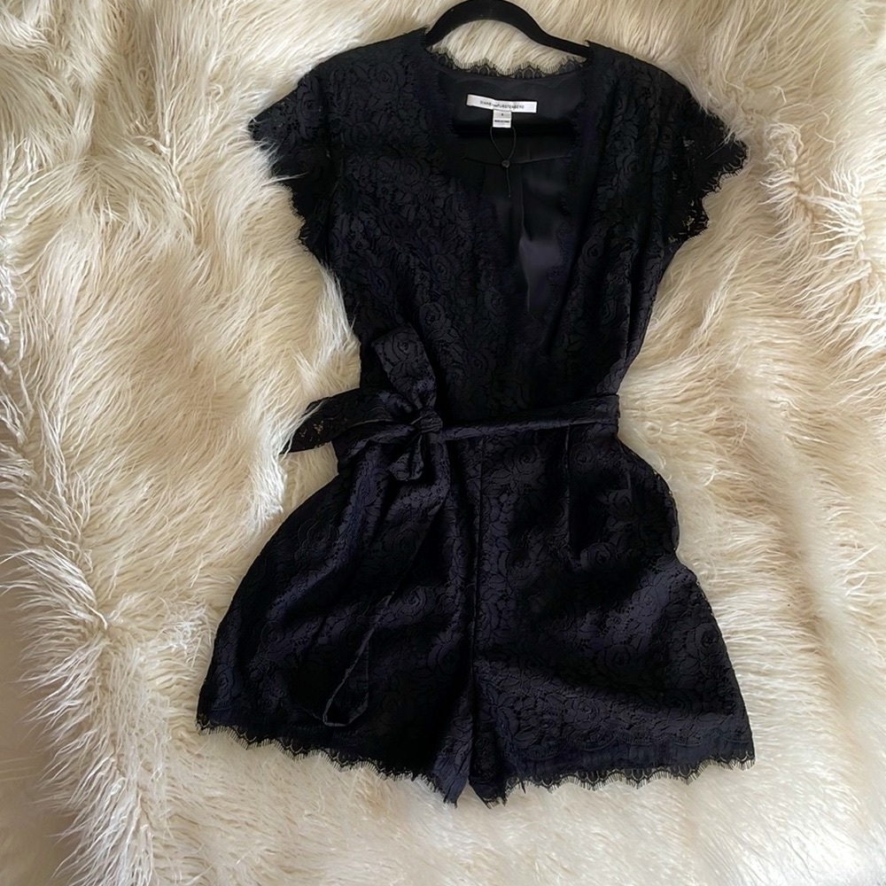 Lace, lined jumpsuit/romper new, tag partially there and never been worn